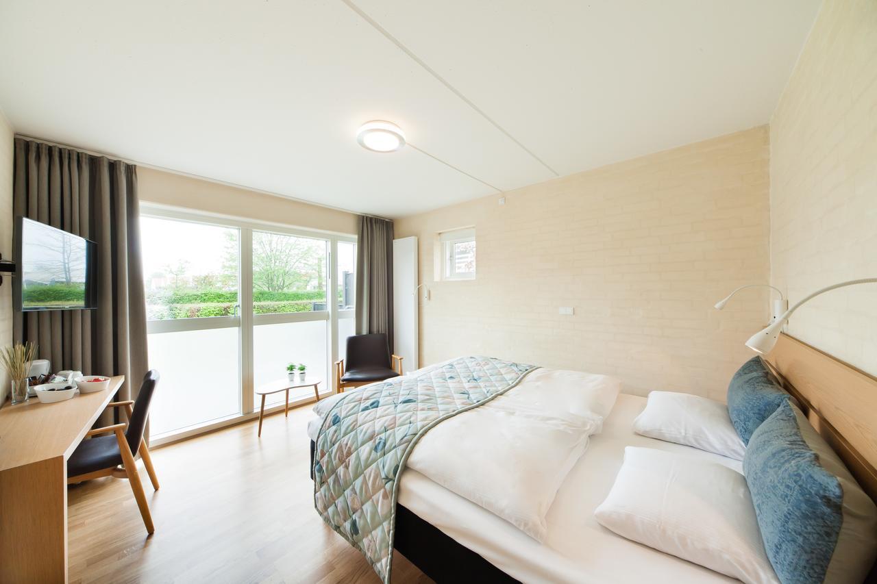 Strandhotel Klinten Aps Рёдвиг Экстерьер фото